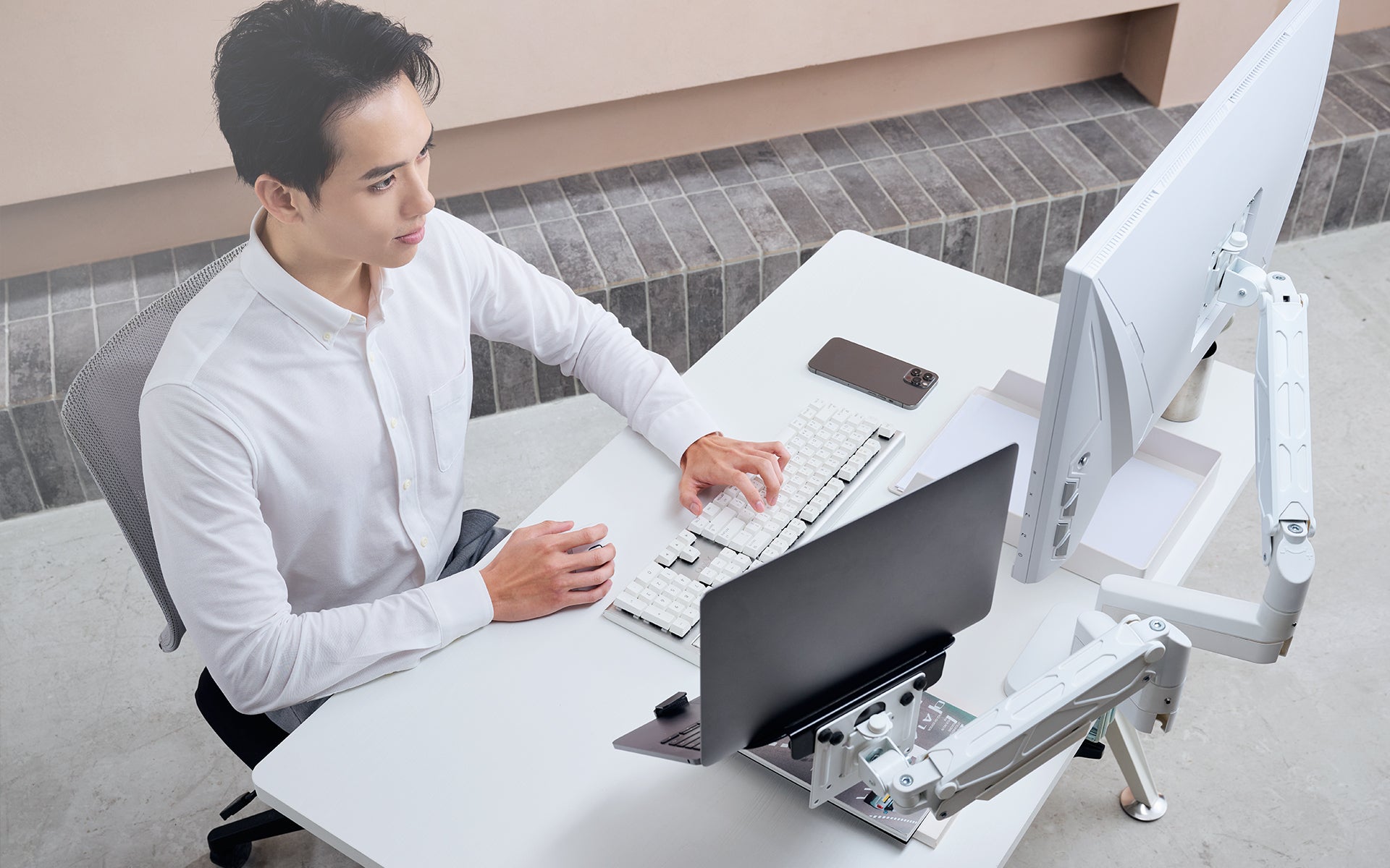 ULTRARM monitor arm and Moodular wooden monitor stand — modular, ergonomic, and designed for VISION ultrawide monitors. Enhances comfort, saves space, and elevates your workspace with precision craftsmanship.