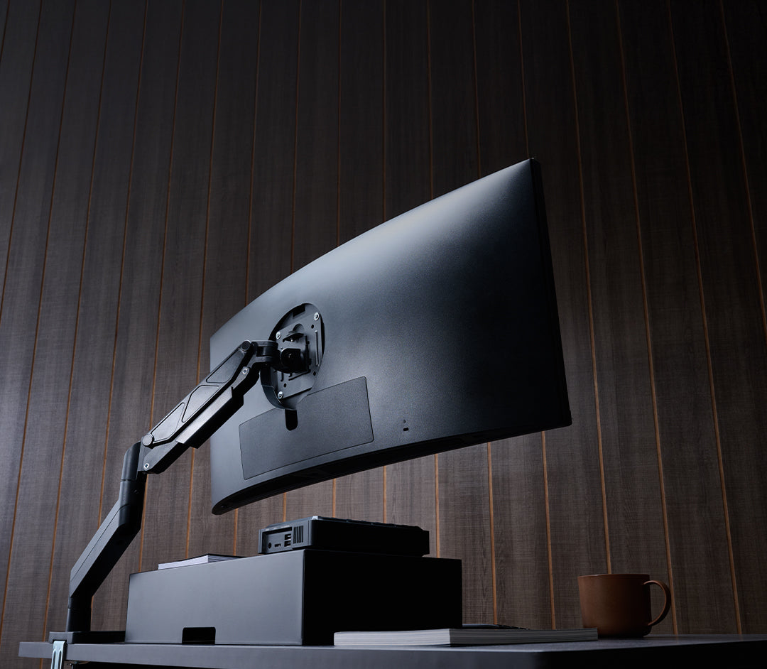 ULTRARM monitor arm and Moodular wooden monitor stand — modular, ergonomic, and designed for VISION ultrawide monitors. Enhances comfort, saves space, and elevates your workspace with precision craftsmanship.